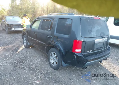 2009 Honda Pilot Touring z USA, uszkodzony, nr VIN 5FNYF48949B014963